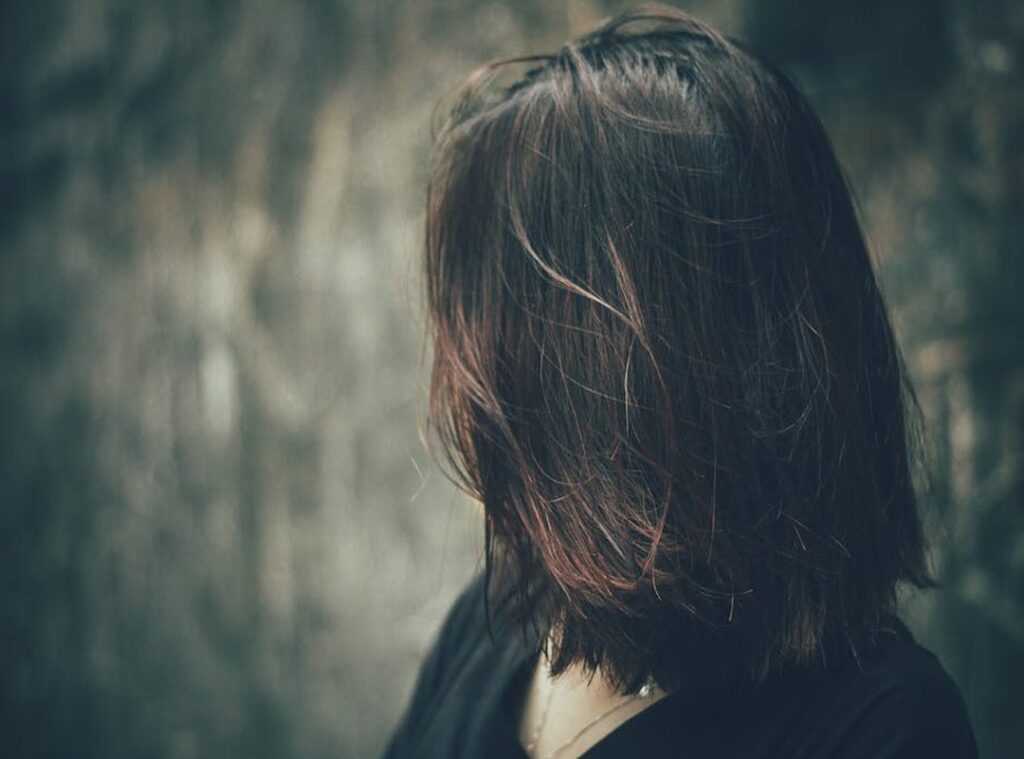 attitude girl hidden face with hair